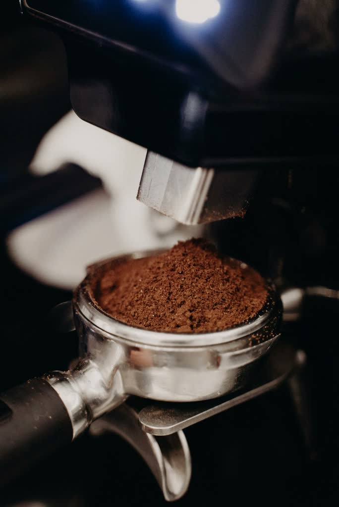 Freshly ground coffee in an espresso portafilter