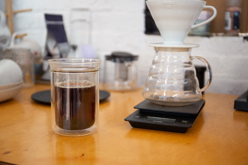 A pour-over dripper on a brew scale